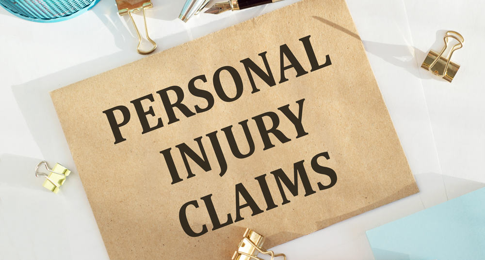 photo of sign stating personal injury claims